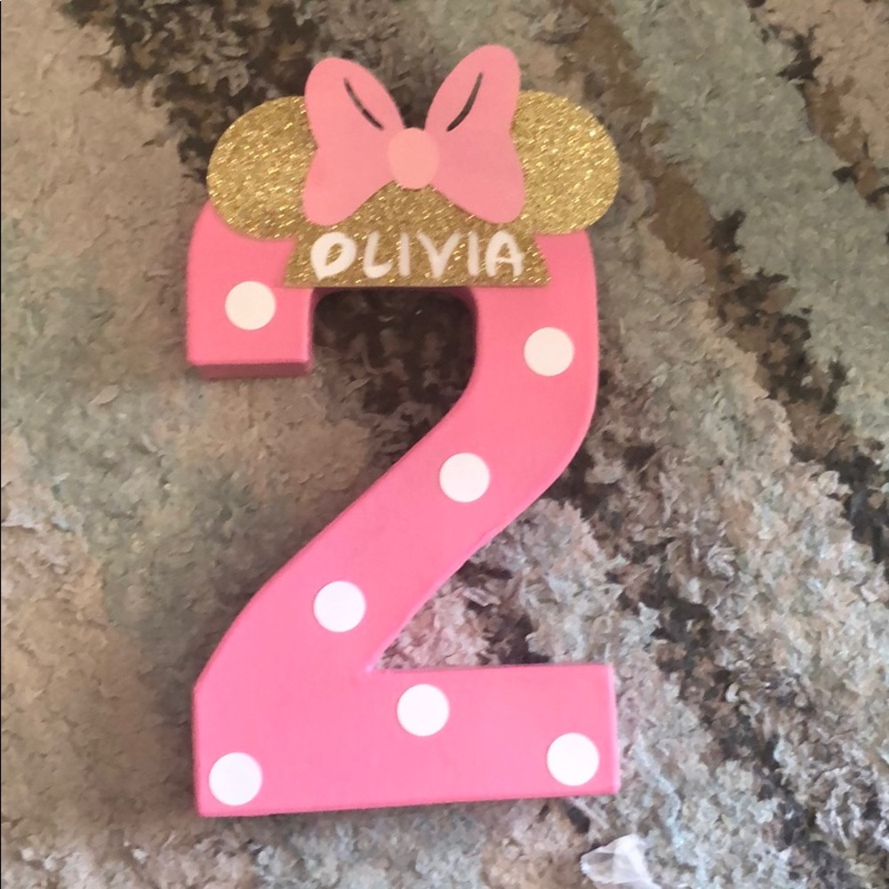 Number 2 birthday decor with Olivia name on it.